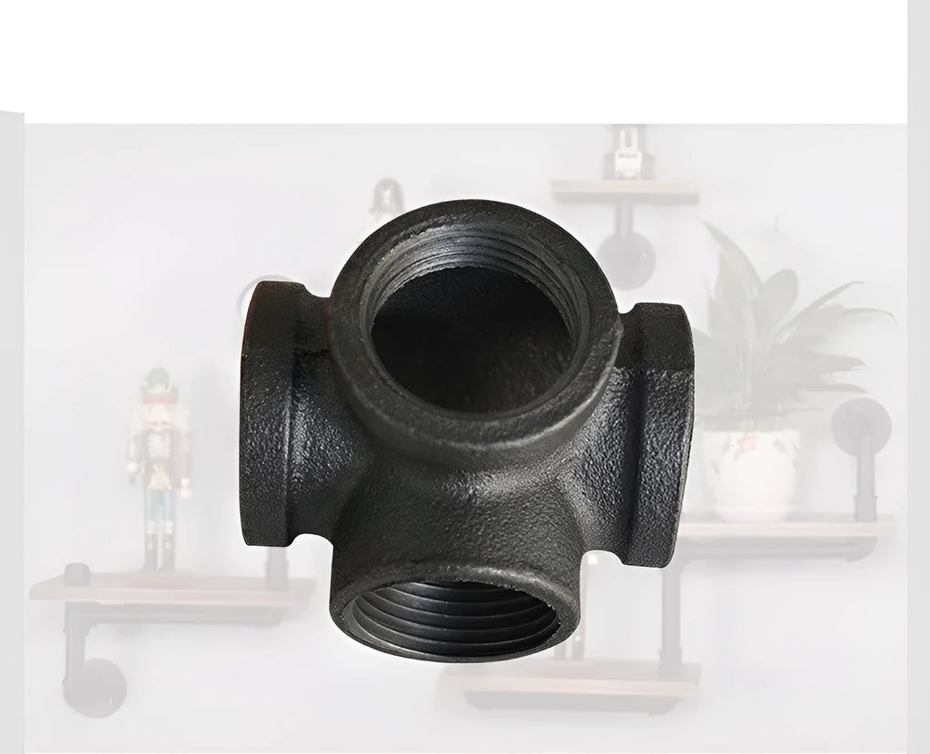 Galvanised steel four-way pipe fitting with three-dimensional corner design for industrial plumbing connections