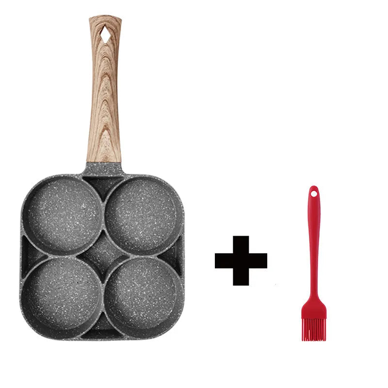 Four-hole non-stick aluminium frying pan with Bakelite handle for cooking eggs and pancakes.