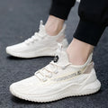 Men's white mesh casual sports shoes with a rubber sole and round toe on a plain background