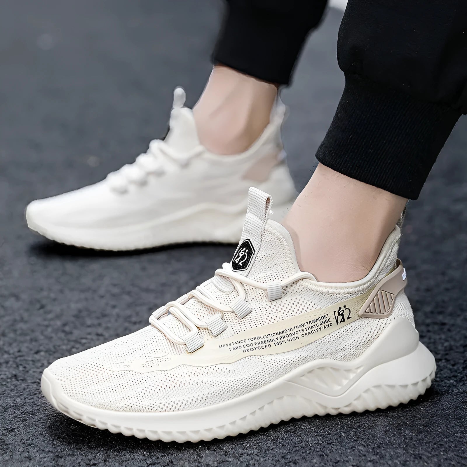Men's white mesh casual sports shoes with a rubber sole and round toe on a plain background