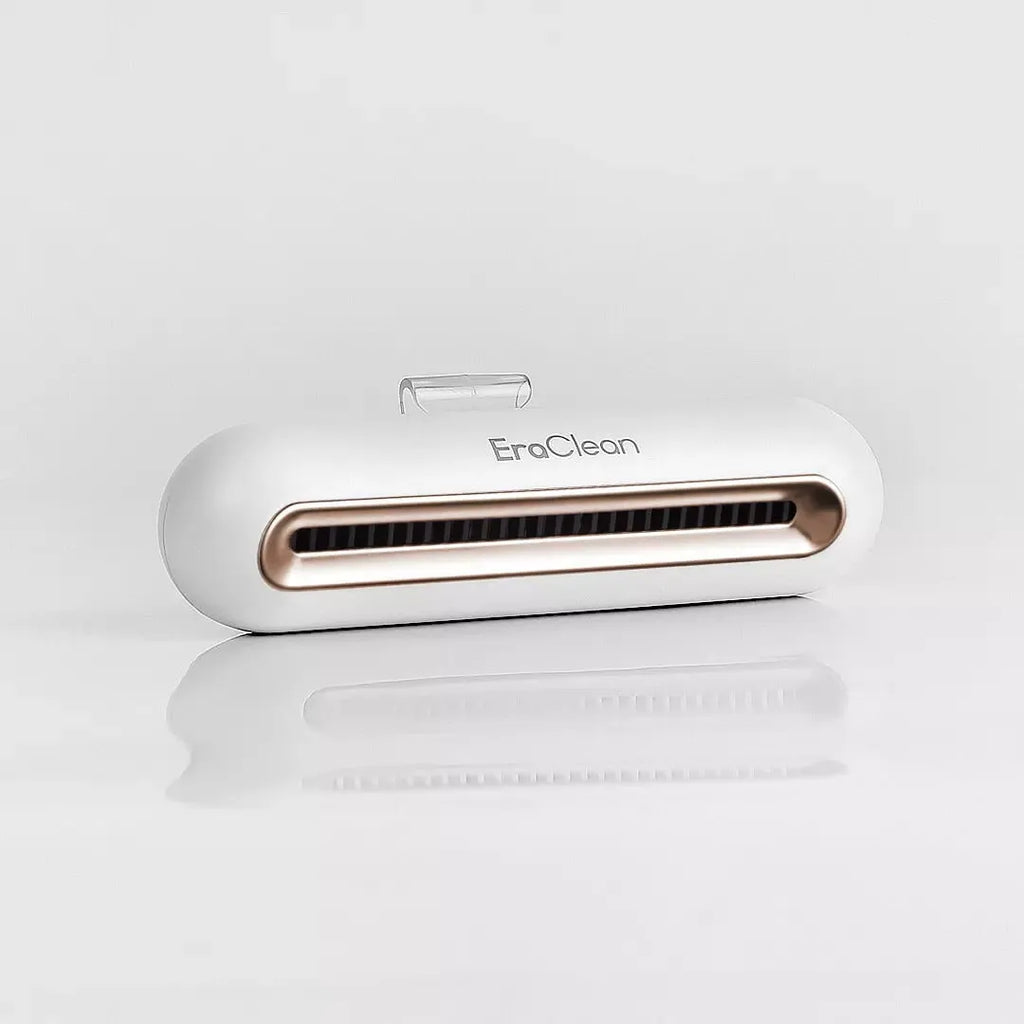 Rose gold coloured USB-powered refrigerator and car deodorant steriliser air purifier unit.
