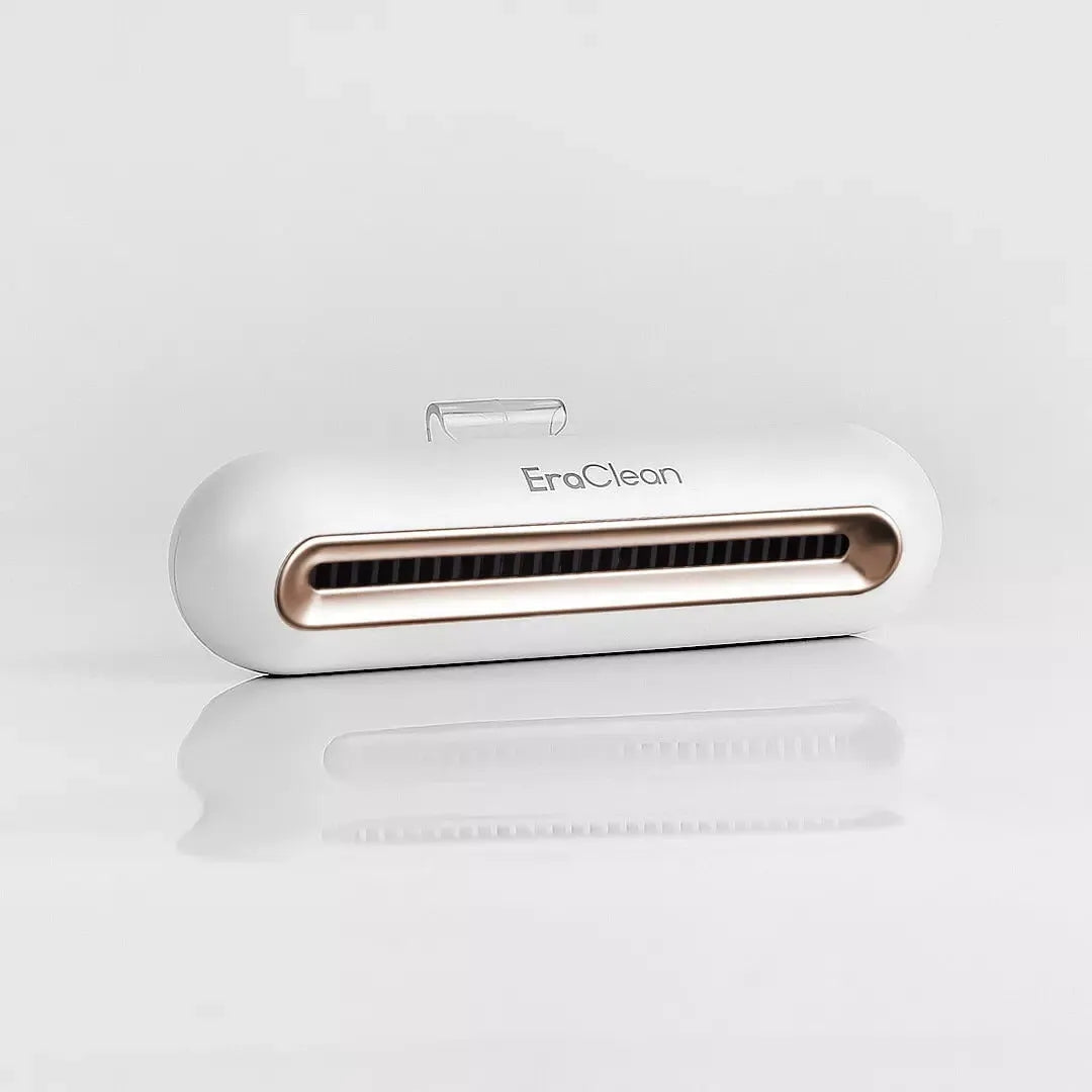 Rose gold coloured USB-powered refrigerator and car deodorant steriliser air purifier unit.