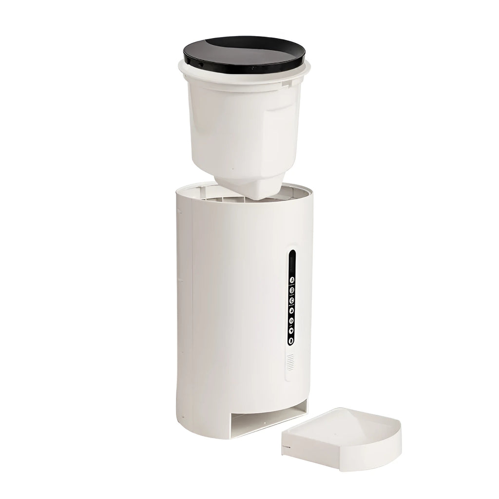 White automatic smart pet feeder with digital timer and large food hopper on a kitchen counter.