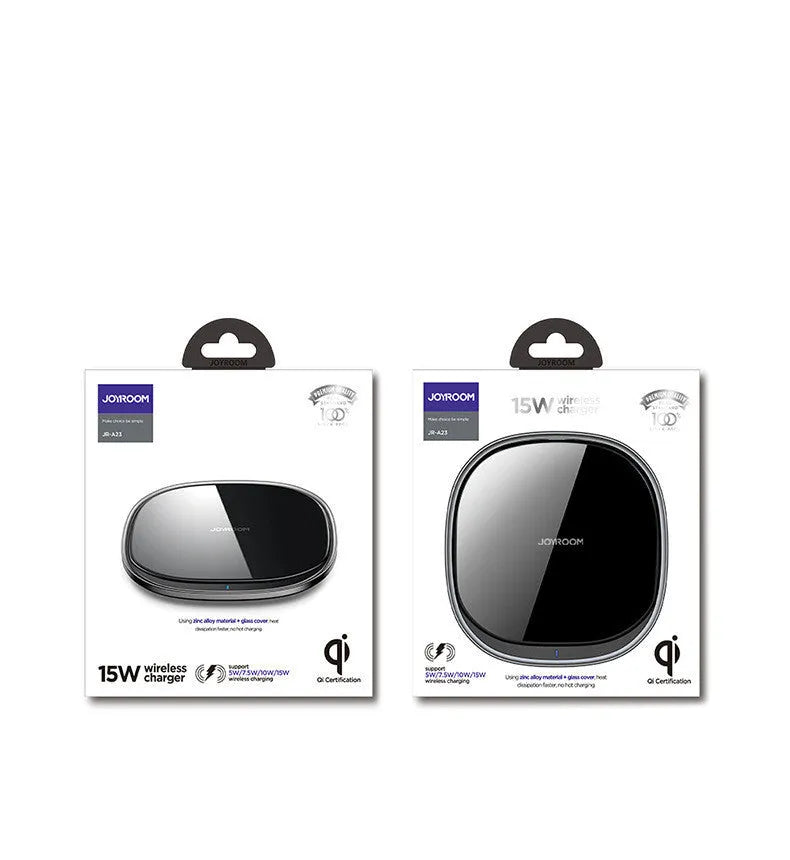 Square black 15W wireless phone charger with a glass top and zinc alloy frame on a desk.