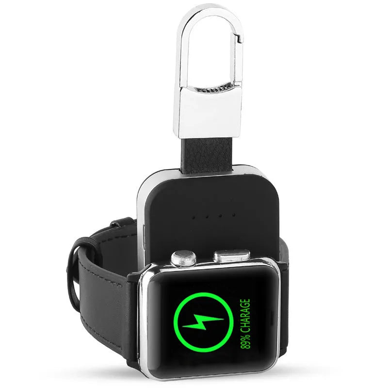 Black portable Apple Watch wireless charger power bank on a keychain.