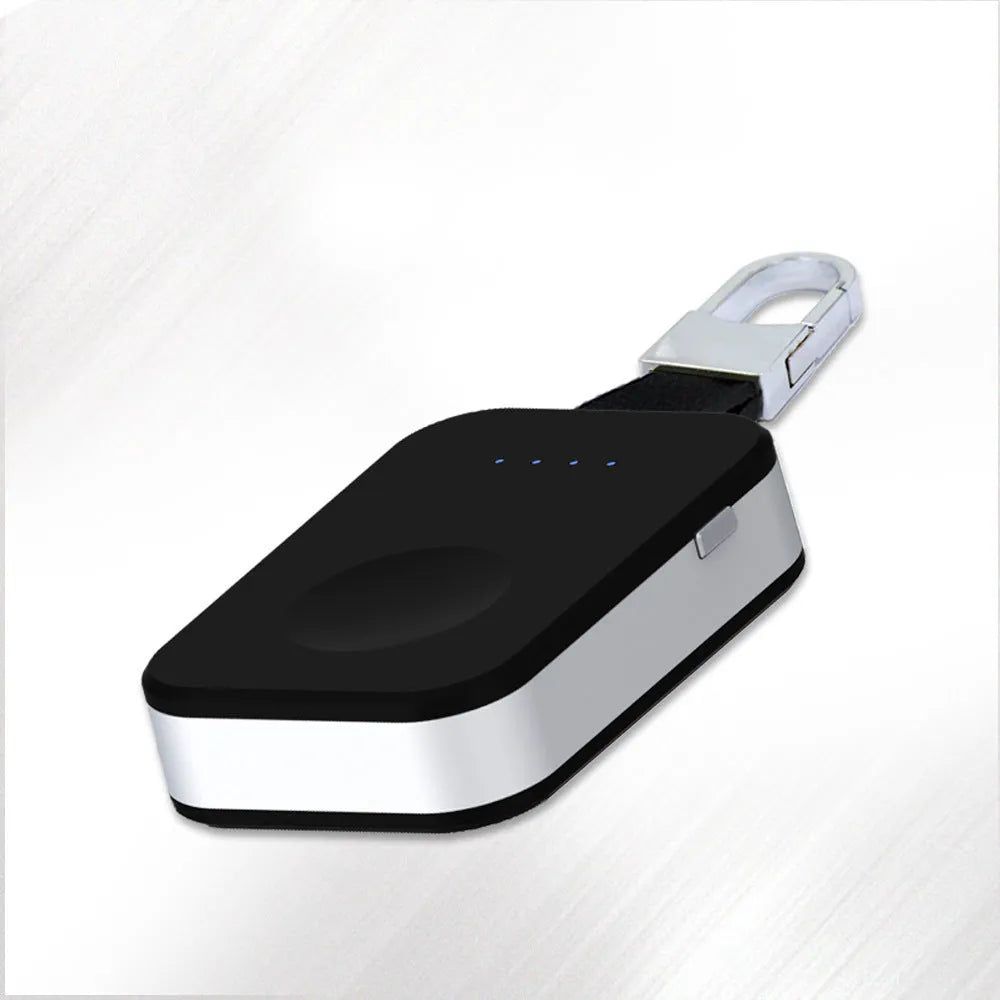 Black portable Apple Watch wireless charger power bank on a keychain.