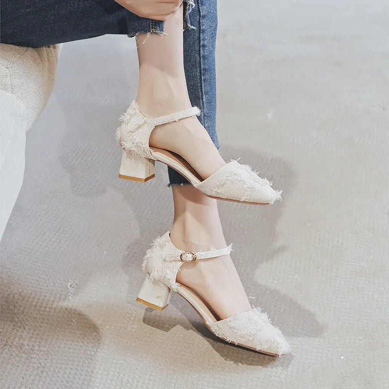 Apricot suede women's flats with an ankle strap and a low dorsay heel.