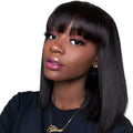 Unice straight black human hair wig at 10 inches length on a wig stand.