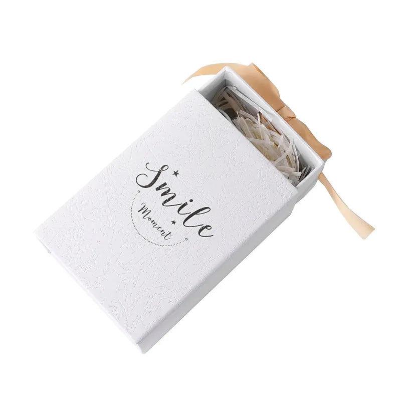 Small cardboard gift box with bronzing detail in multiple colour options