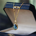 Gold geometric pendant on a French retro style copper chain necklace.
