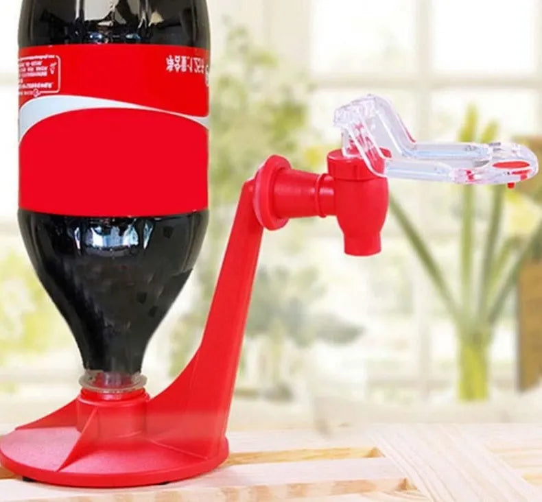 Red Magic Tap soda dispenser attached to inverted 2-litre bottle for push-button drink serving