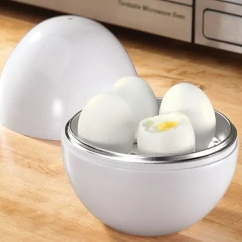 White microwave egg steamer cooker with capacity for four eggs.