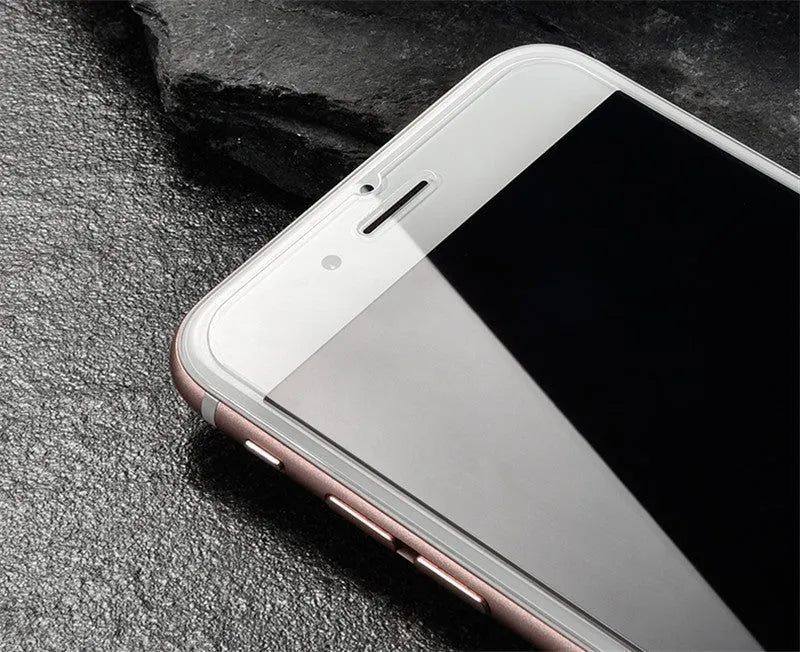 Pack of three transparent tempered glass screen protectors for iPhone models.