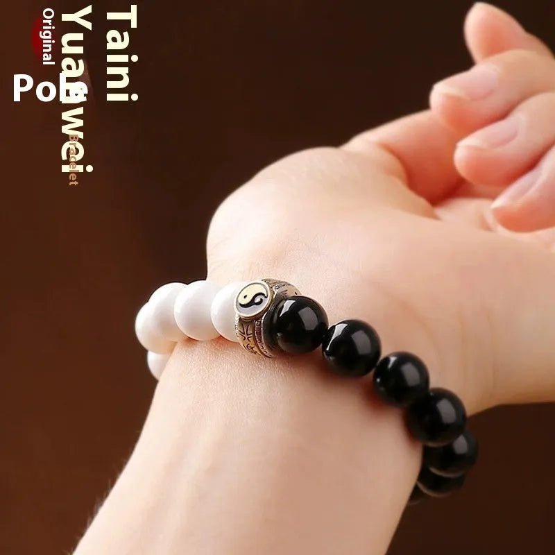 Black and white obsidian bodhi seed taiji bracelet with geometric beads and mantra engraving
