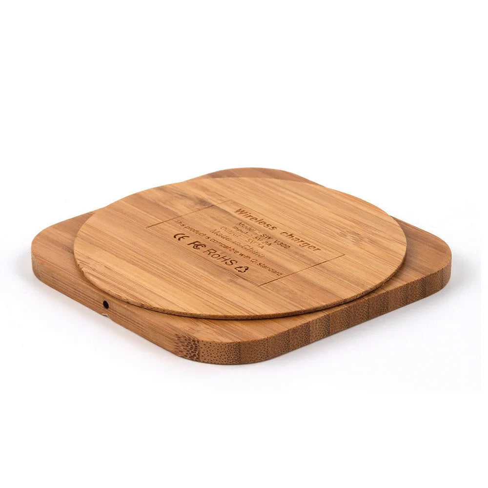 Square wooden bamboo 5W Qi wireless charger on a surface