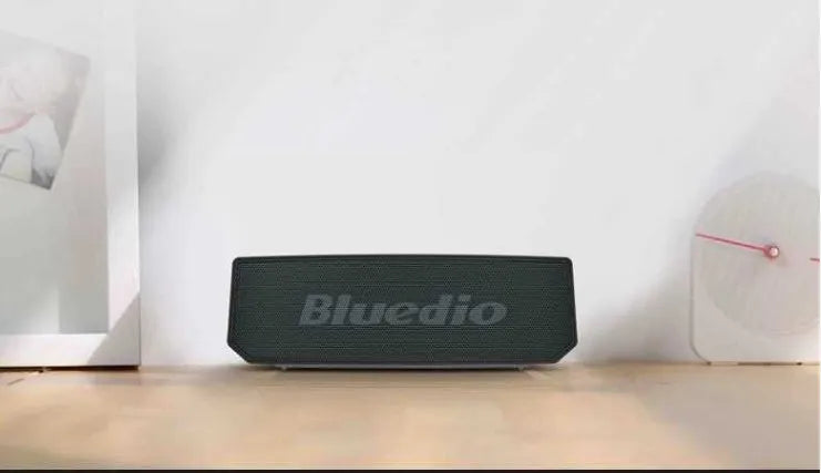 Black BS-6 cloud smart speaker with compact dimensions and micro-USB charging port