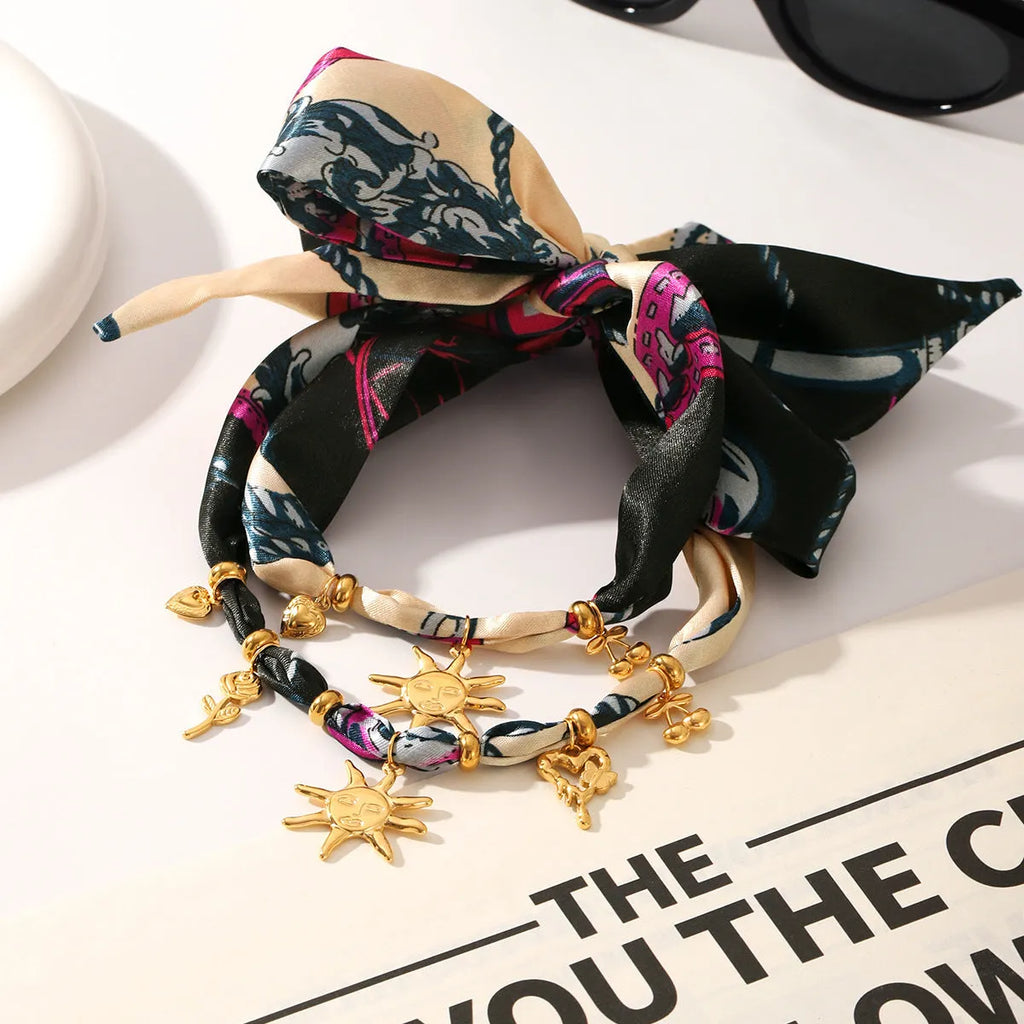 Sunflower stainless steel charm on a ribbon bracelet for children, ins style