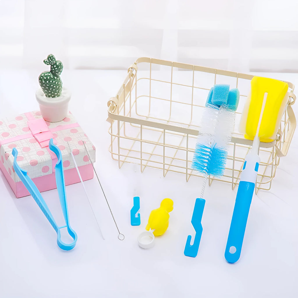 Orange Belle seven-piece bottle brush set in blue and pink includes sponge brush, nylon brush, nipple brushes, straw brushes, and bottle holder