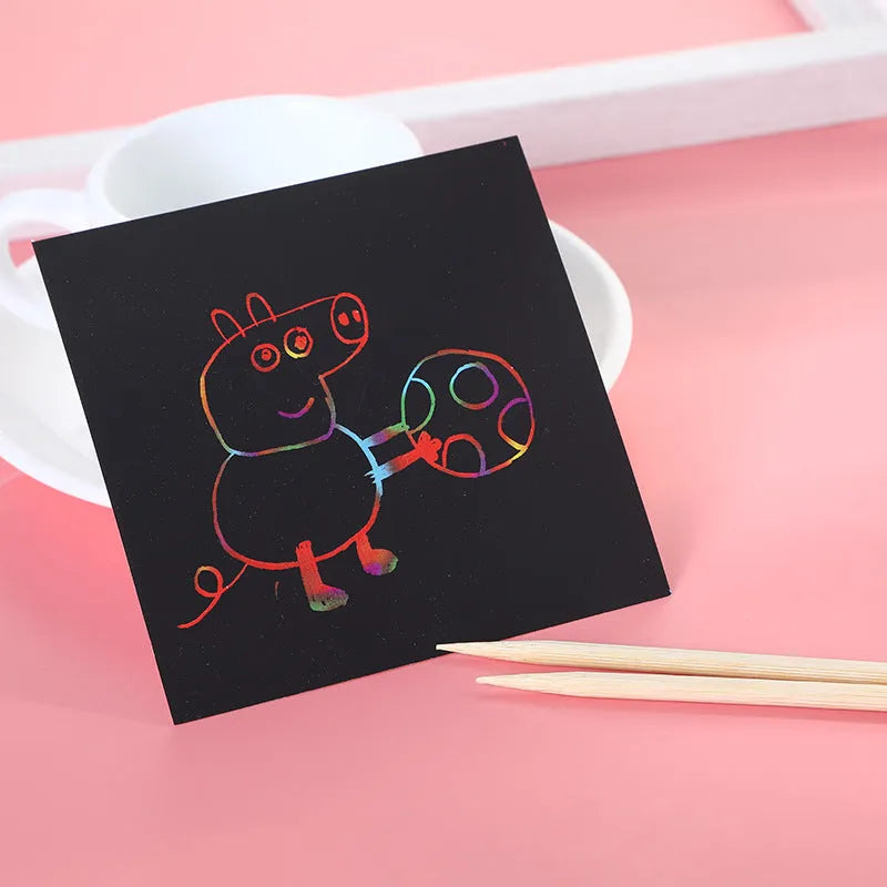 Colour box containing 100 black scratch art cards and a wooden stylus for kids' creative painting.