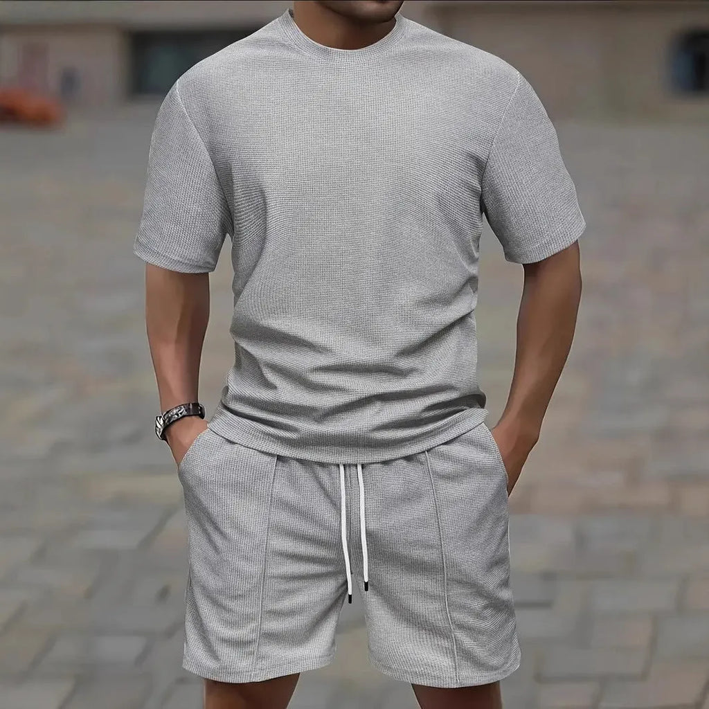 Men's apricot waffle texture short sleeve blouse and matching shorts laid flat