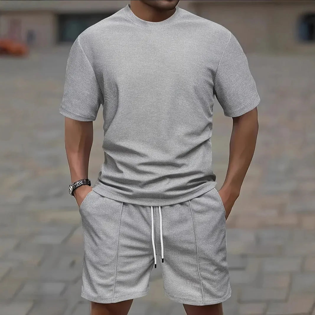 Men's apricot waffle texture short sleeve blouse and matching shorts laid flat