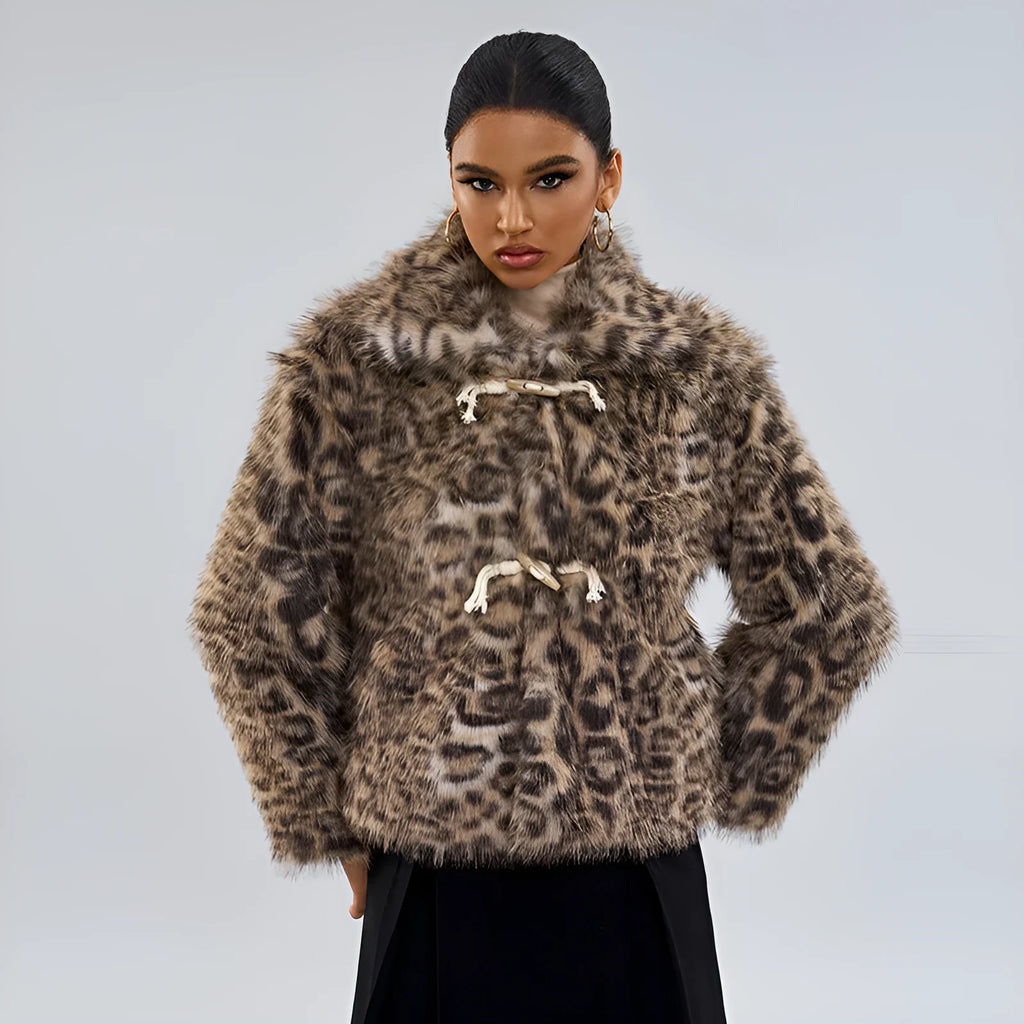Women's leopard print coat with a buckle on the lapel.