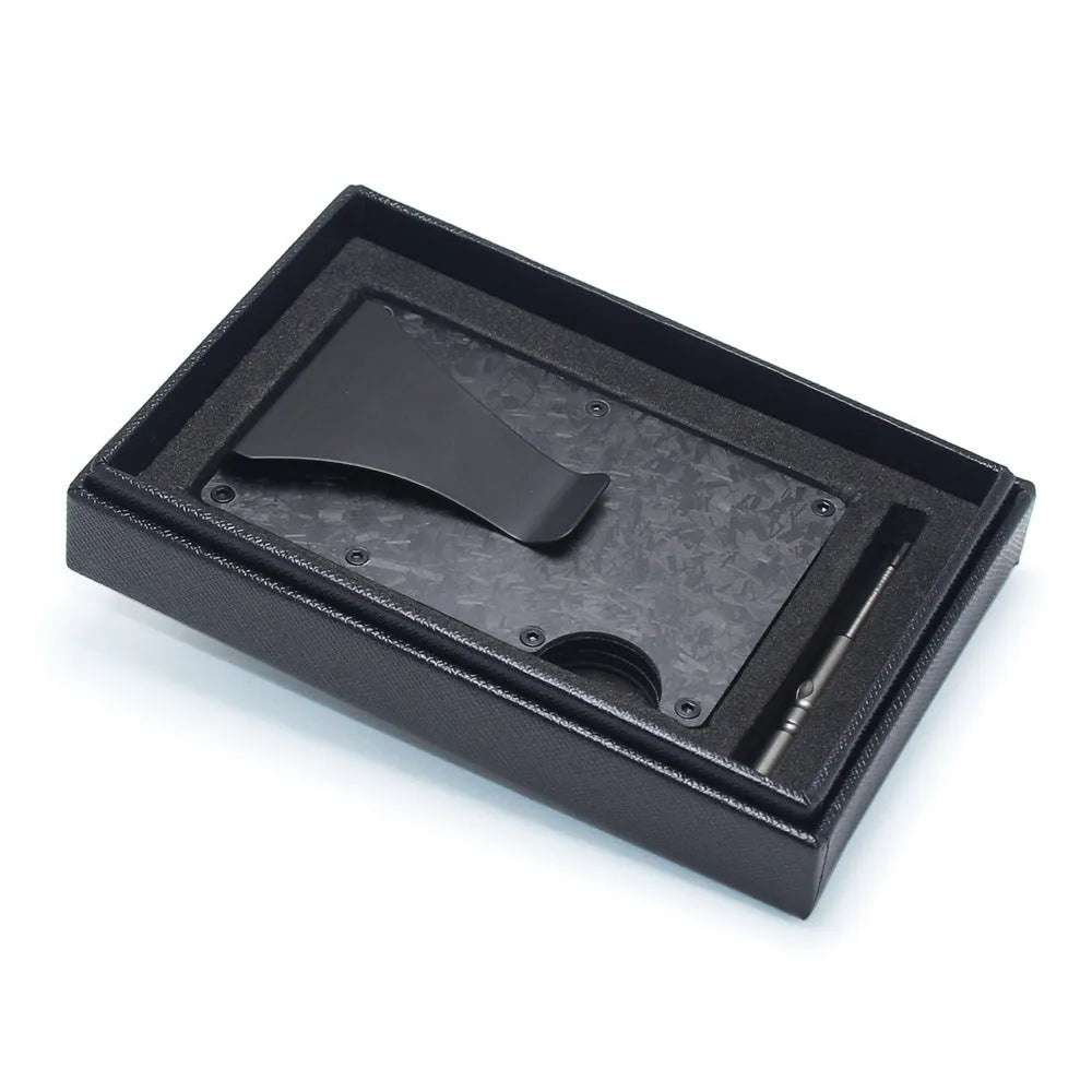 Slim geometric carbon fibre card wallet in multiple colours on a gift box.