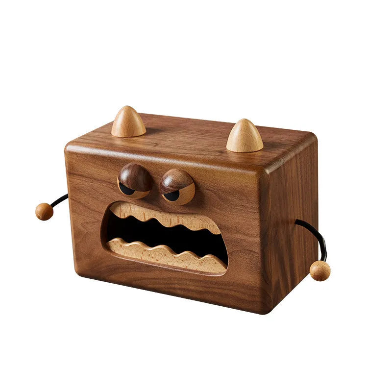 Solid wooden tissue box cover with cartoon monster carving in natural beech finish