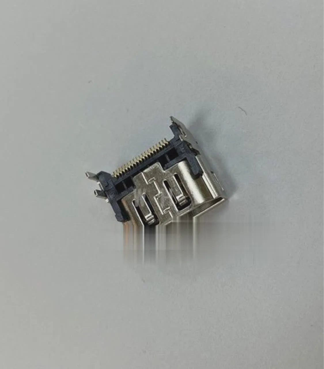 Silver HDMI interface host socket gaming accessory with 19-pin connector