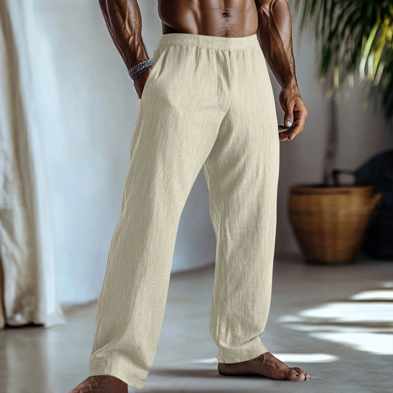 Cotton and linen straight-leg casual trousers in a solid colour with visible pockets.