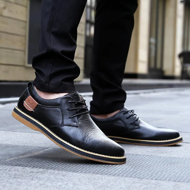 Large size 48 men's British style leather shoes in black with microfiber upper and rubber sole