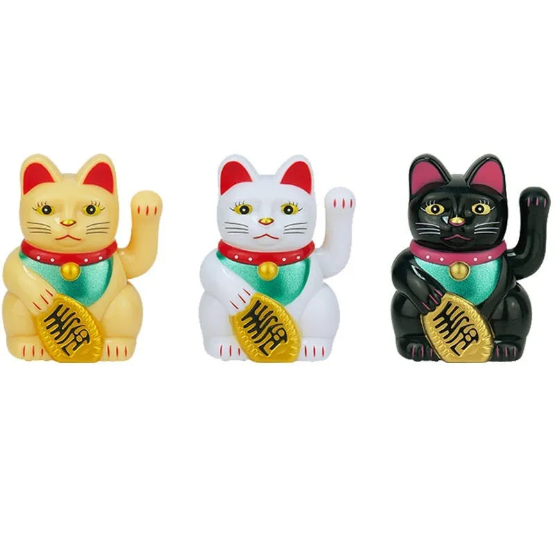Solar-powered yellow Maneki Neko lucky cat decoration waving its arm