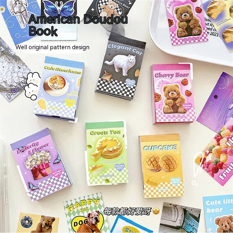 Cartoon mini sticker book open showing 4x6cm adhesive sheets in various colours on copper board paper.