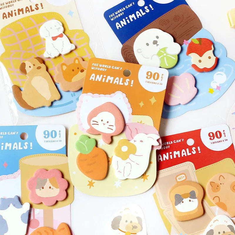 Animal-shaped sticky note set showing six cute designs including bunny, kitten, puppy and sea otter themes