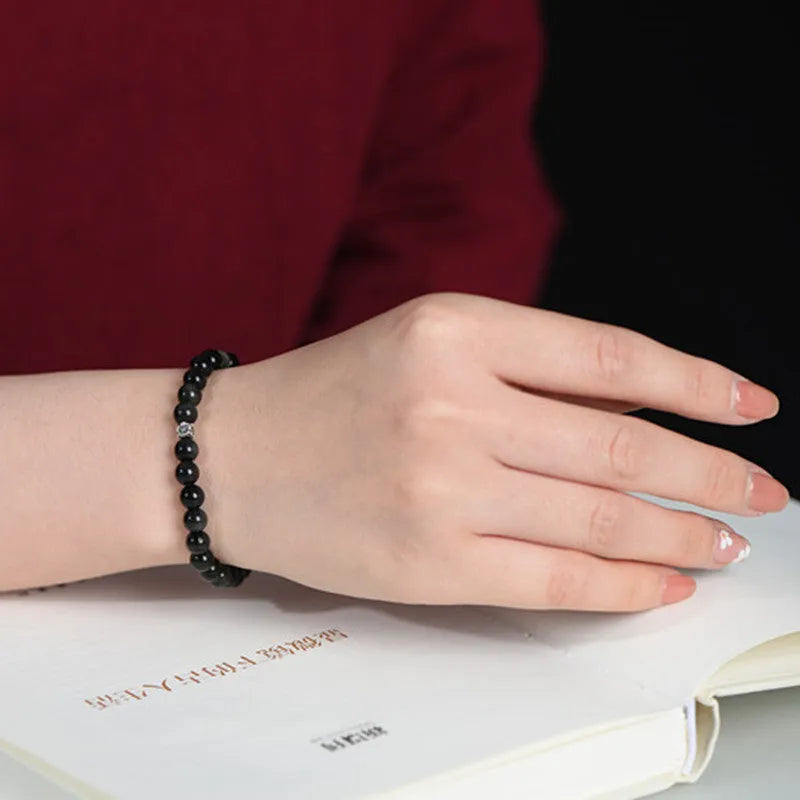 Natural black obsidian bracelet with S925 silver flower accessories and constellation dragon phoenix decorations