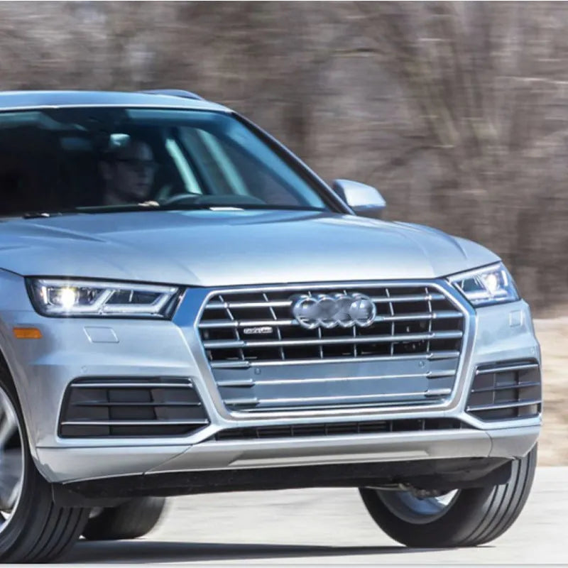 Black ABS front bumper lower grille for Audi Q5 2018-2022 models showing left and right fog light frames