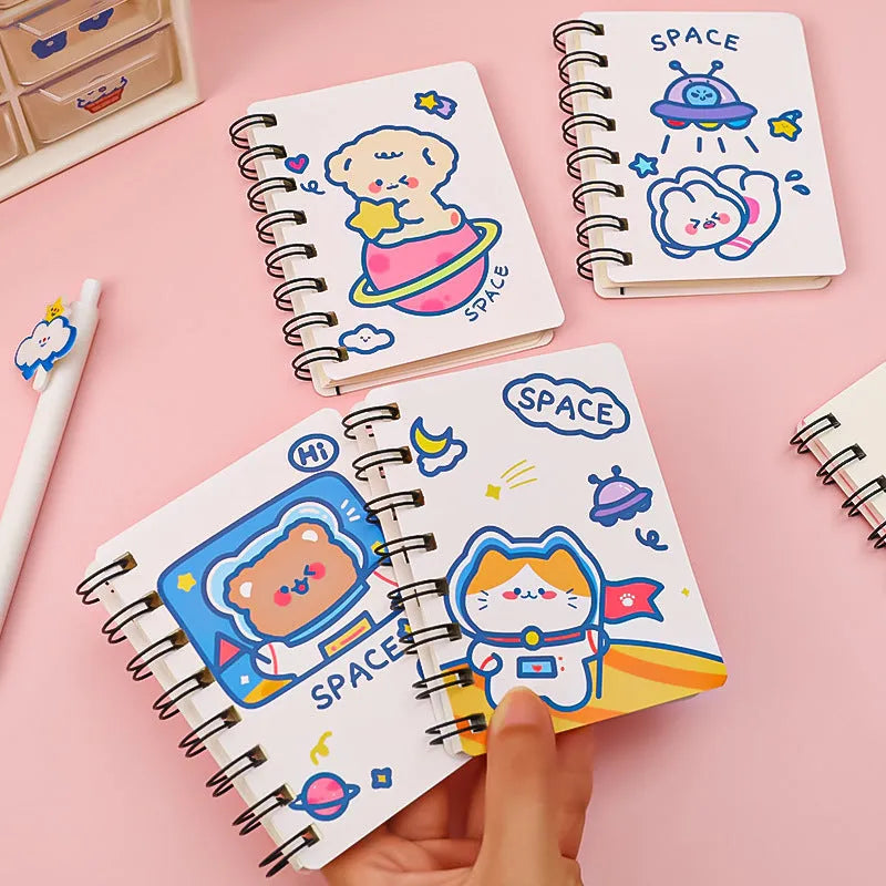 Astronaut flipped portable pocket flipper notebook showing space-themed cover designs at 10.5cm by 8cm