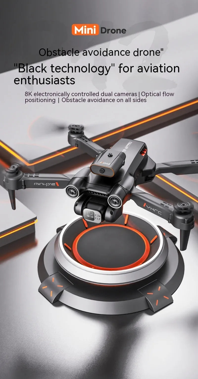 Black P12 foldable quadcopter drone with four propellers and a front-mounted HD camera on a grey surface