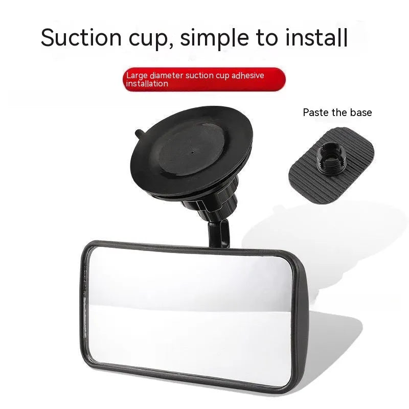 Black 360-degree rotating car rearview mirror with a suction cup mount on a windscreen.