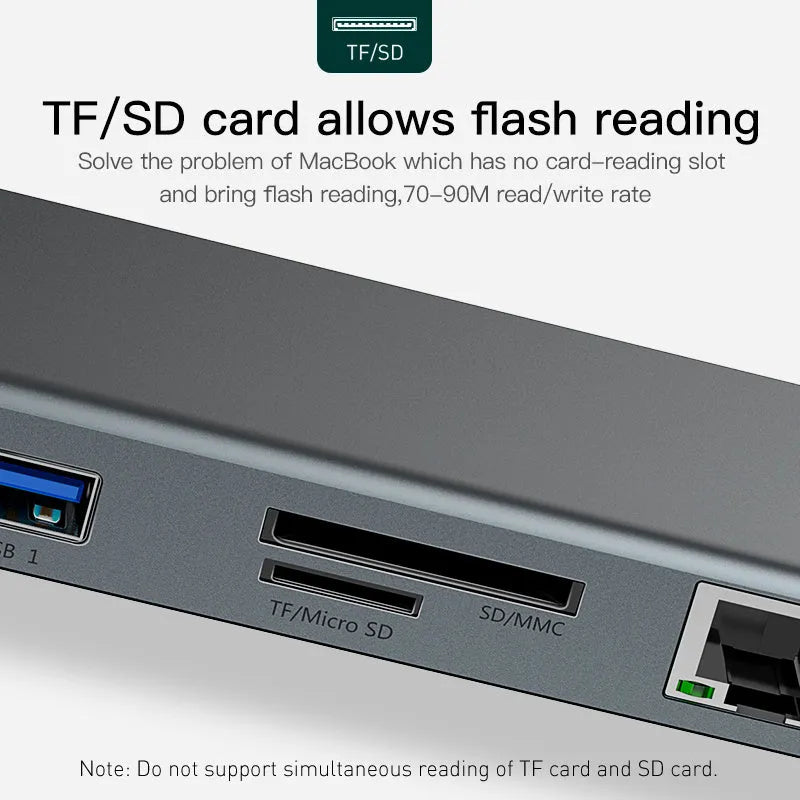 Grey aluminium USB C ten-port docking station with cooling bracket showing HDMI, VGA, and network ports