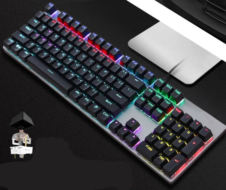 AOC GK410 mechanical keyboard with full 104-key layout, metal frame, and backlit keys on a desk.