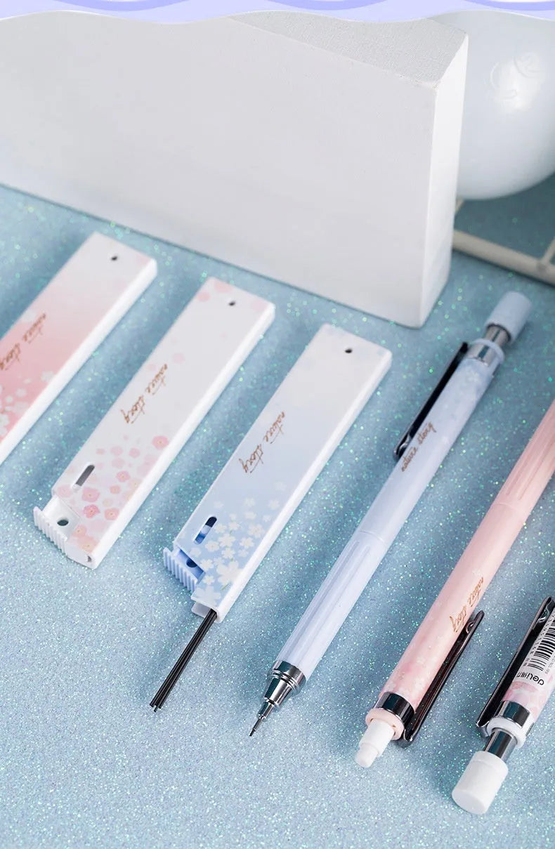 Cartoon automatic pencil set with three 0.5mm HB pencils and refill boxes in mixed colours