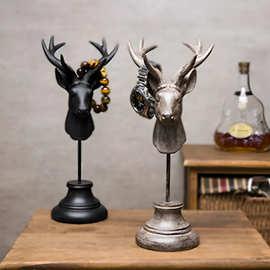 A tall black resin animal sculpture ornament for home decoration on a wooden surface.