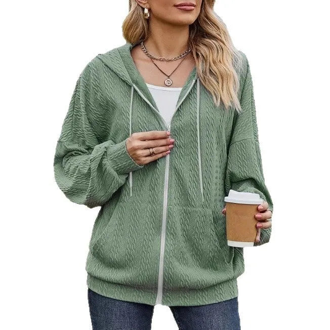 Green women's hooded sweater coat with full zipper front in a loose casual fit.