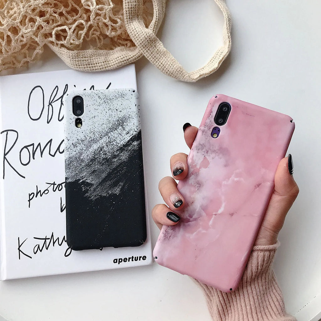 Black painted polycarbonate back cover case for a Huawei smartphone on a white background.