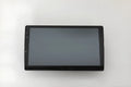 Black universal 10.1 inch Android car stereo head unit with touchscreen on a dashboard