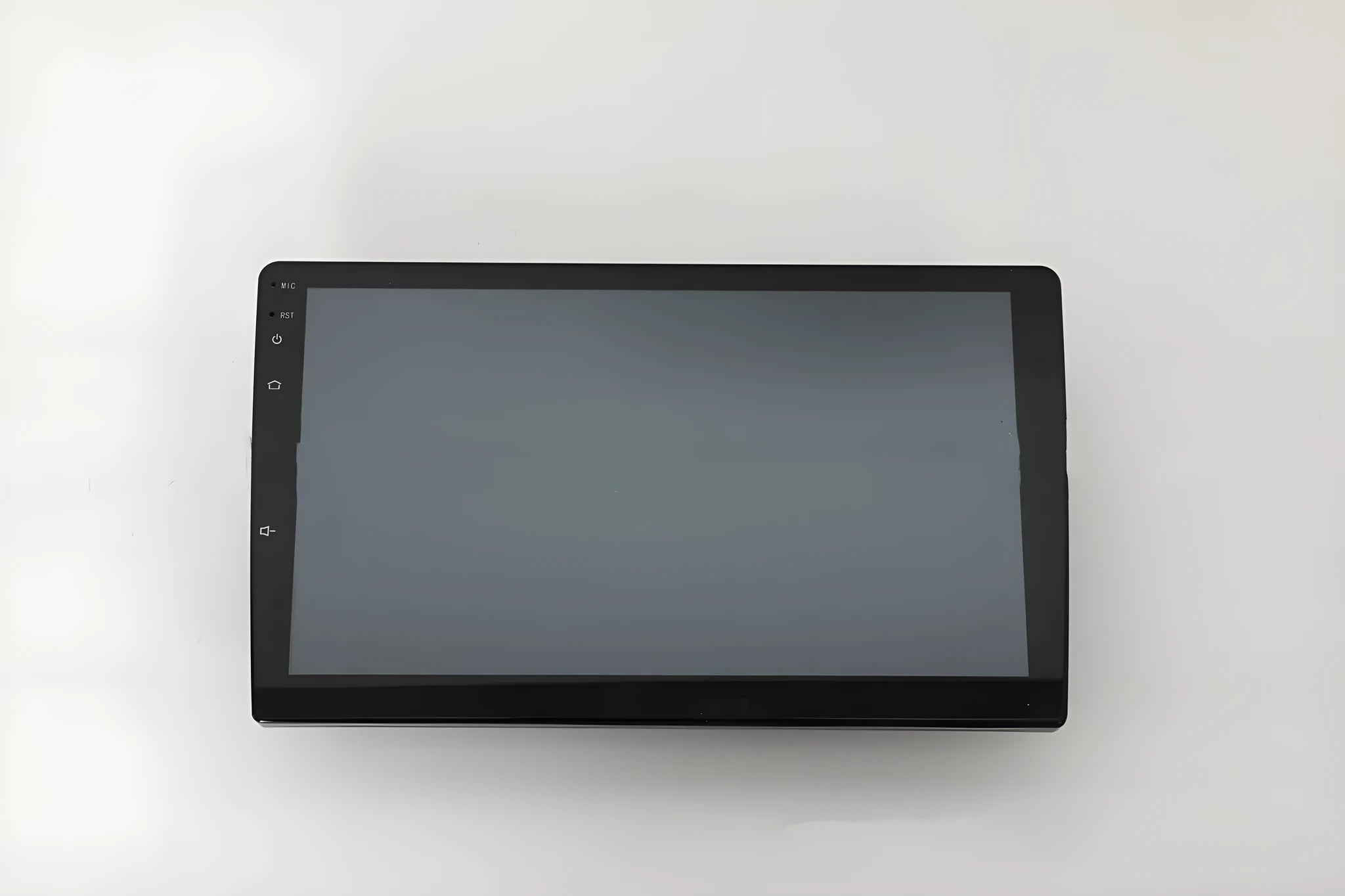 Black universal 10.1 inch Android car stereo head unit with touchscreen on a dashboard