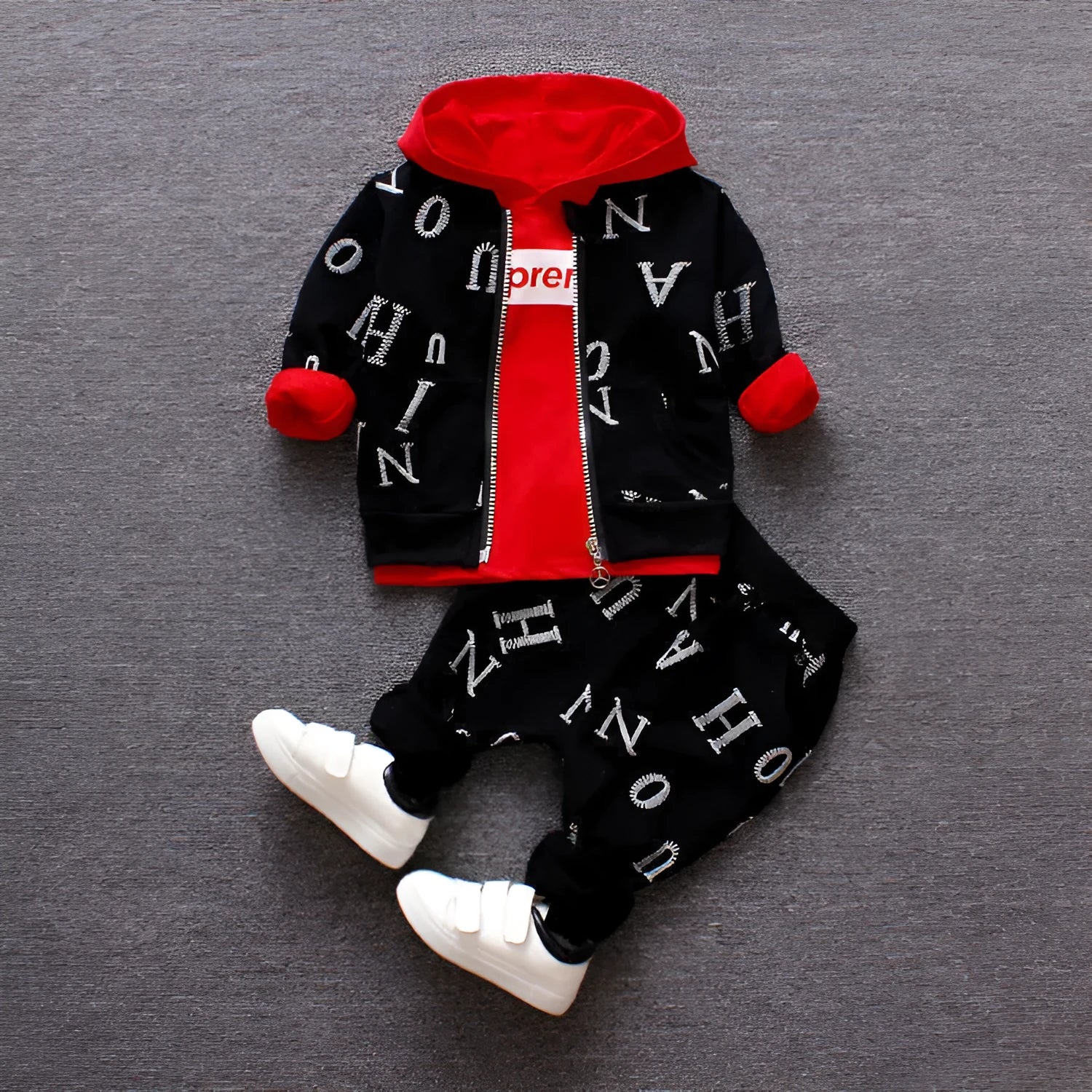 Children's long sleeve clothing set in red or white colours made from polyester and vinylon blend fabric