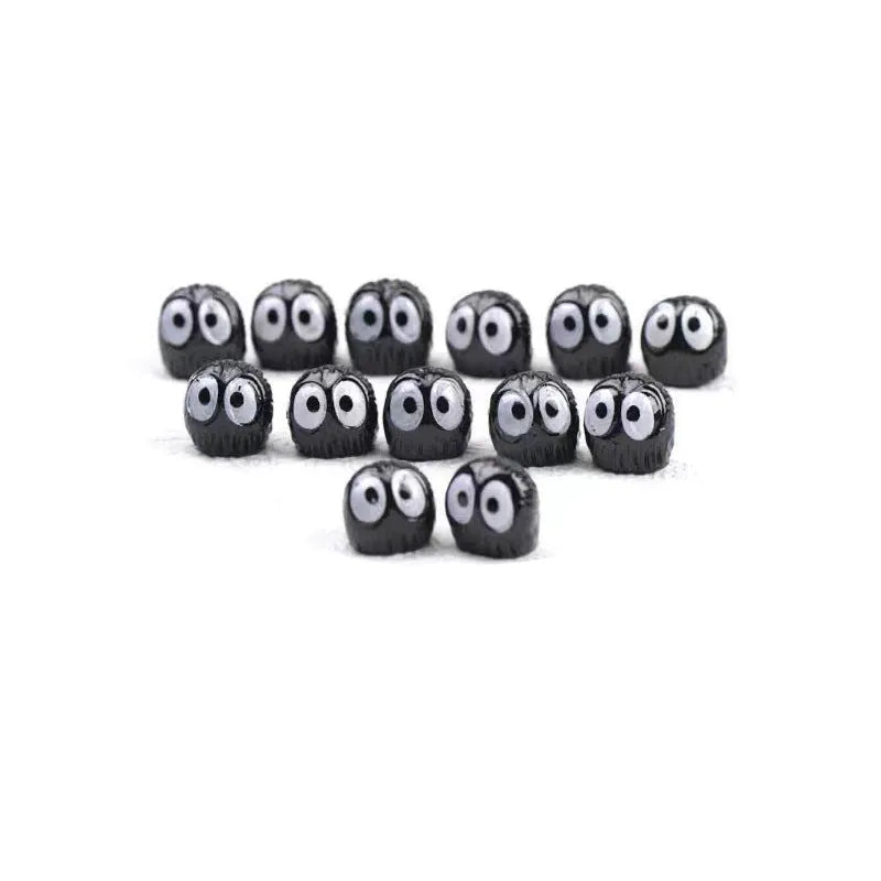 Black cartoon briquette resin car decoration ornament with traceless tape.