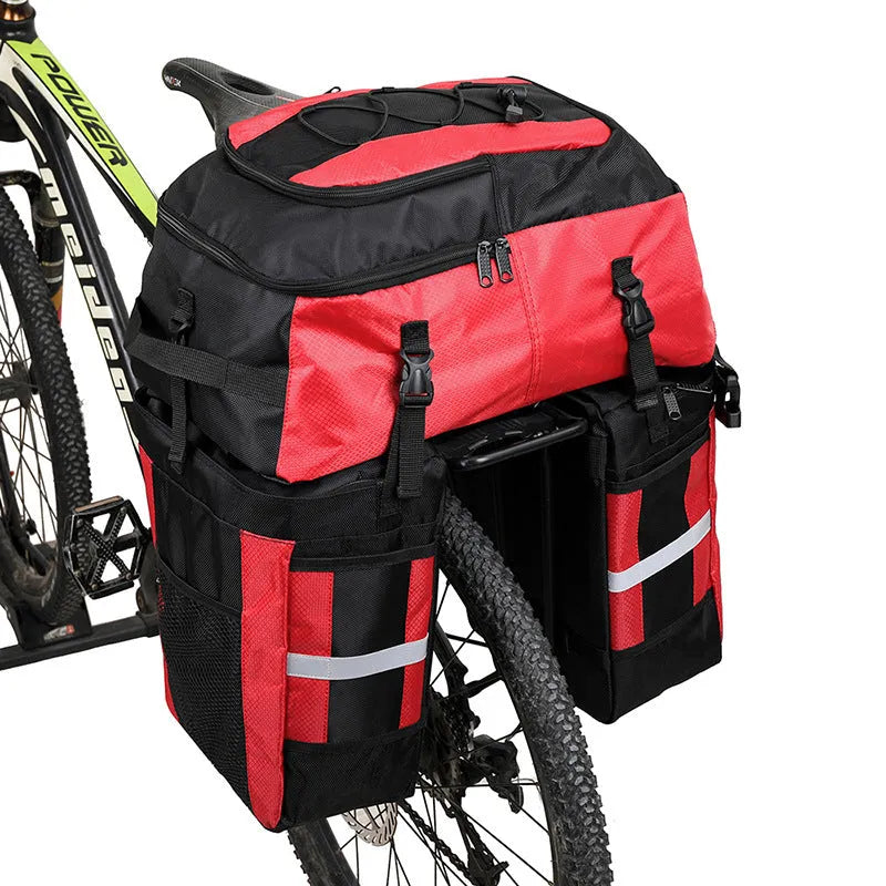 Rhinoceros brand green 70 litre bicycle rear frame storage bag mounted on a bike for touring.